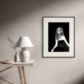 Content art print by Hilde Alet Malan in a black frame mount, on a wall
